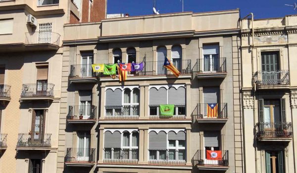 Catalan independence flags and banners in favour of breaking away from Spain hang from balconies in Barcelona